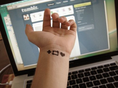 10 People Sporting Social Media Tattoos